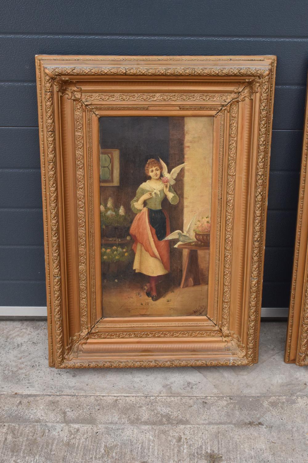 A pair of 19th century oil paintings on canvas depicting pretty ladies in room settings. - Image 3 of 14