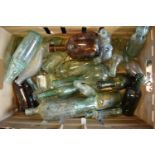 A collection of vintage glass bottles to include various local interest such as William Stretch