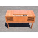 HMV teak radiogram unit. 96 x 44 x 60cm. In good condition with signs of age-related wear and