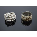 Two designer silver rings: One with multiple mobile silver balls, maker Kch, .925 London import