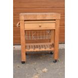 A modern 20th century mounted butcher's block on wheels with a drawer. 70 x 52 x 85cm. In good