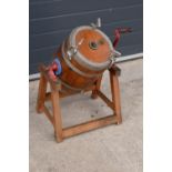 Early 20th century oak barrel butter churn on a wooden stand made by Hathaway of Chippenham. In good