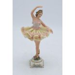 A late 19th/ early 20th century Dresden lace figure of a ballerina with the 'N' mark below a 5-