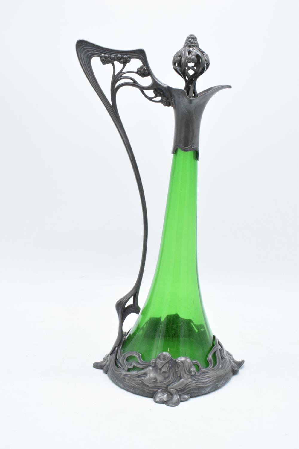 A WMF art nouveau pewter claret jug with threaded stopper, tapering green glass body and designed - Image 2 of 10