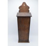 A Victorian wooden candle box / salt box with working hinges. 54cm tall. Generally in good condition
