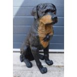 A large resin lifesize figure of a Rottweiler or similar dog. In good condition with some wear. 62cm