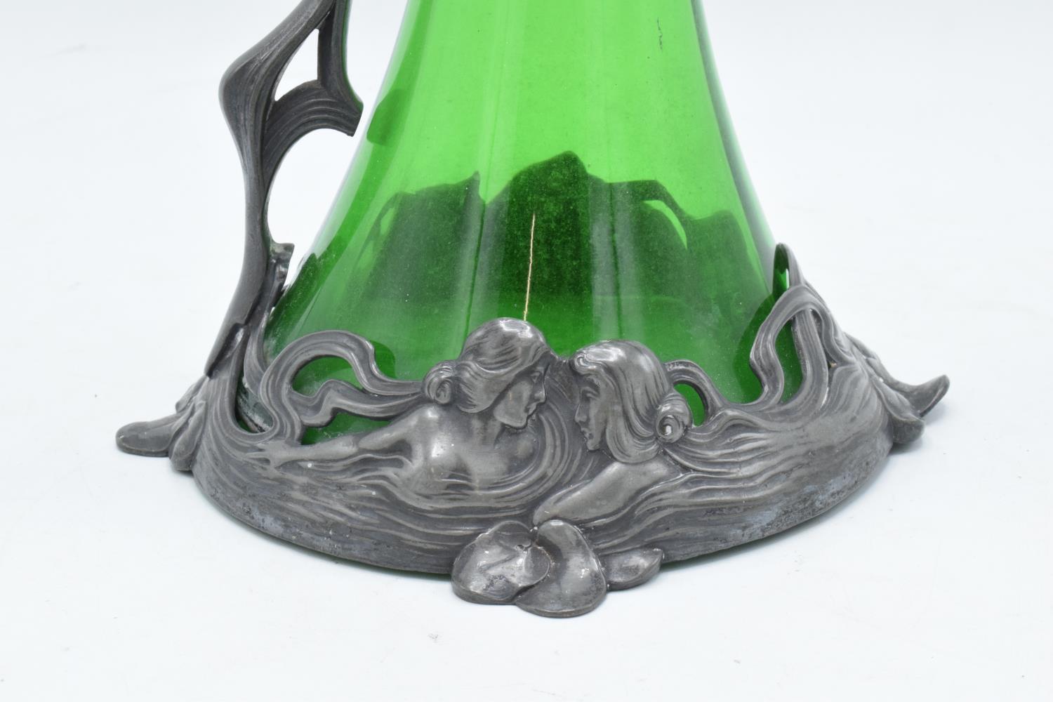 A WMF art nouveau pewter claret jug with threaded stopper, tapering green glass body and designed - Image 4 of 10