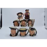 A collection of small Royal Doulton character jugs to include Athos, Porthos, Aramis, Robin Hood,