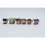 A collection of Tiny Royal Doulton character jugs to include Cardinal, John Peel, Sam Weller,