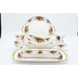 A collection of Royal Albert Old Country Roses items to include a gravy boat and saucer, a cake