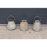 A collection of aluminium milk churns/ buckets/ pails with handles (3). Approx 54cm tall. All in