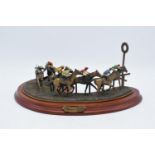 A limited edition Marks Models metal and enamelled horse racing scene 'Turning for Home', Number 477