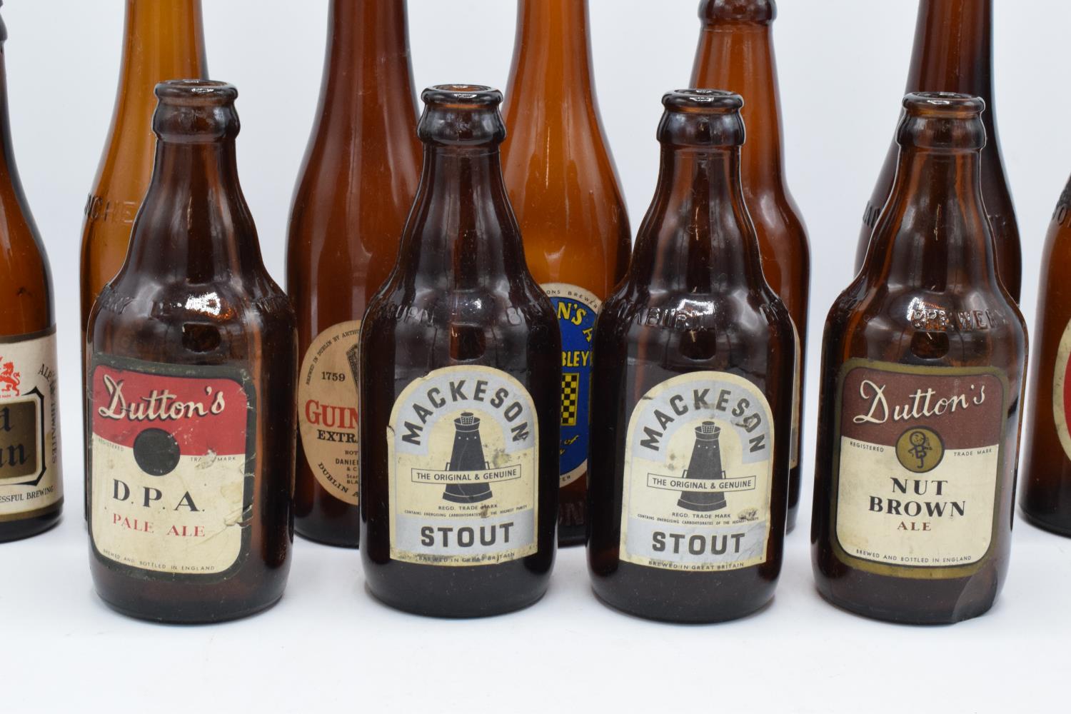 A collection of vintage 20th century beer bottles (mainly brown) to include makes such as Mackeson - Image 3 of 6