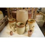 A collection of Victorian and later stoneware items to include kitchen storage jars, churns, pots, a