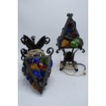 A 1960s wrought iron and coloured glass table lamp together with a hanging lantern, believed to be