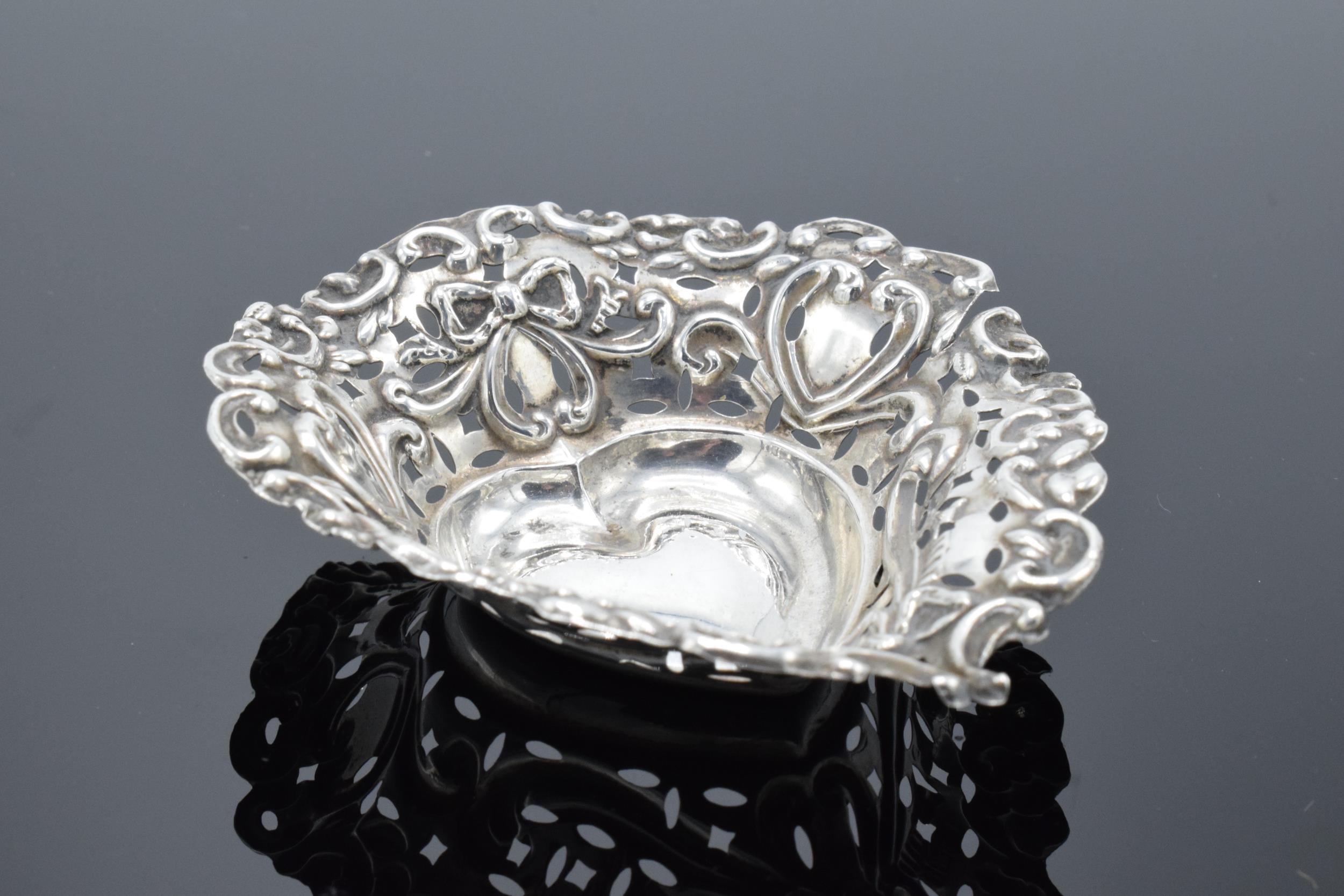 An ornate silver sweet dish/ small tray Birmingham 1900. 9cm by 7cm. 11.9 grams.