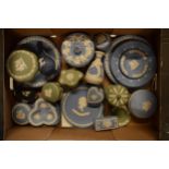 A collection of Wedgwood Jasperware in various colours such as sage green, blue, black, white/grey