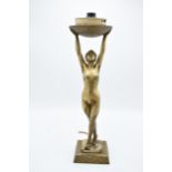An Art-Deco nude figural lamp base with the lady supporting the light shade with impressed '