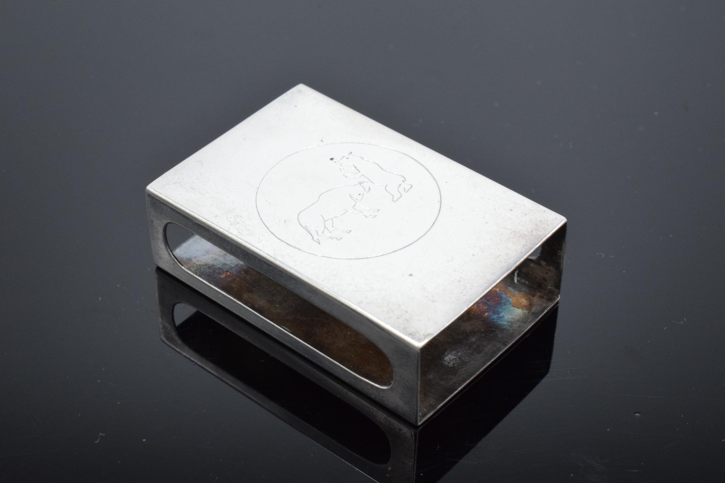 A sterling silver match box holder 'Bull and Bear' by Reed and Barton. 11.9 grams. - Image 3 of 6