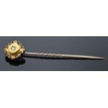 9ct gold diamond stick pin. Gross weight 2.3 grams. 7cm long.