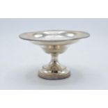 A loaded silver comport hallmarked for Birmingham 1920 or 1945. 14cm diameter. In good condition
