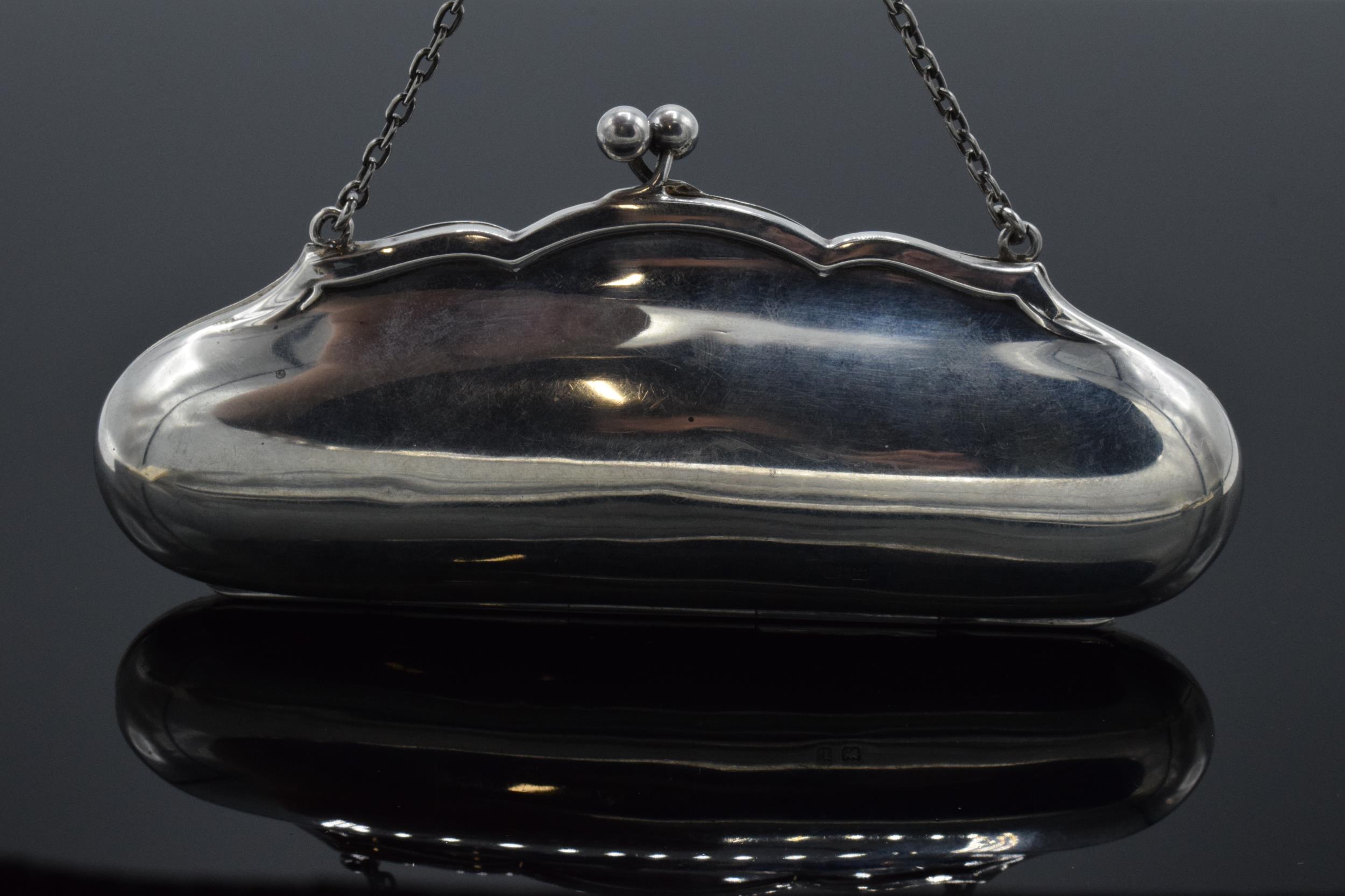 Silver ladies purse on chain with fitted interior. Birmingham 1916. 66.3 grams gross weight.