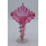 An early 20th century cranberry glass Jack in the Pulpit vase. 21cm tall. In good condition with