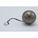 An unusual silver tea ball, believed to be Indian from the mid 19th century. 40.8 grams. Unmarked.