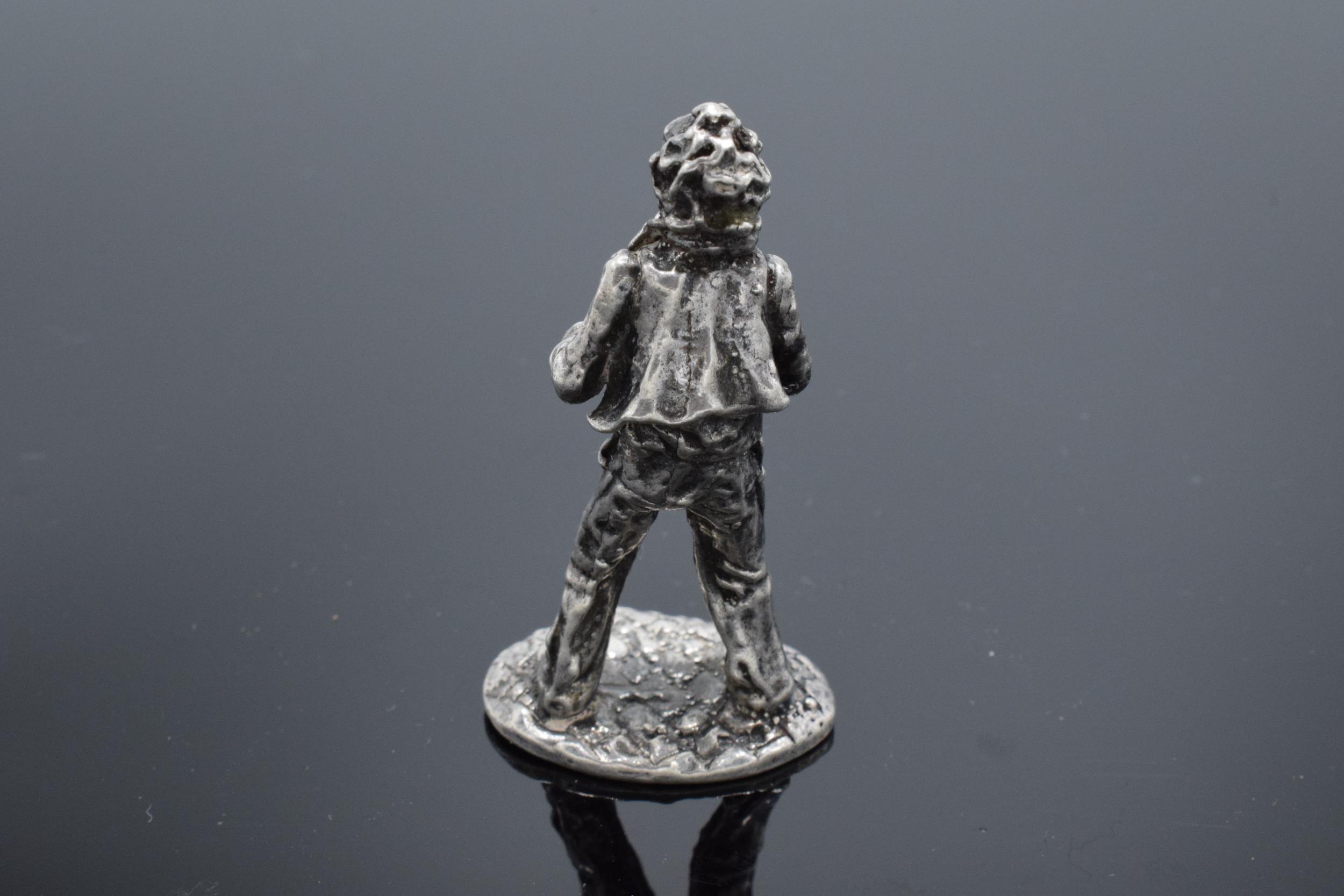 A silver model of a male saxophonist. With London import silver marks for late 20th century. 37.4 - Image 2 of 3