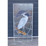 An early to mid 20th century lead framed stained glass window depicting a bird. Generally in good