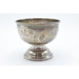 A silver footed bowl with floral decoration. Hallmarked for Birmingham 1972. 178.4 grams. 12.5cm