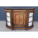 A Victorian breakfront credenza with flanking display cabinets. All with working lock and key.