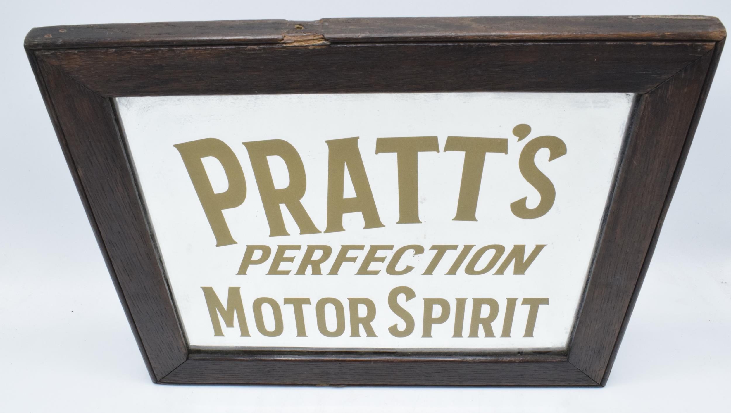 A Pratt's Perfection Motor Spirit advertising mirror mounted in a wooden frame. 37 x 32cm inc frame.