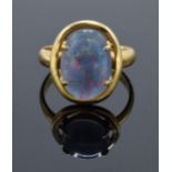 18ct gold ring set with a large opal stone. UK size Q/R. Total weight 5.8 grams.