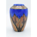 Clews and Co of Tunstall Chameleon Ware vase decorated with blue and orange decoration. 14cm tall.
