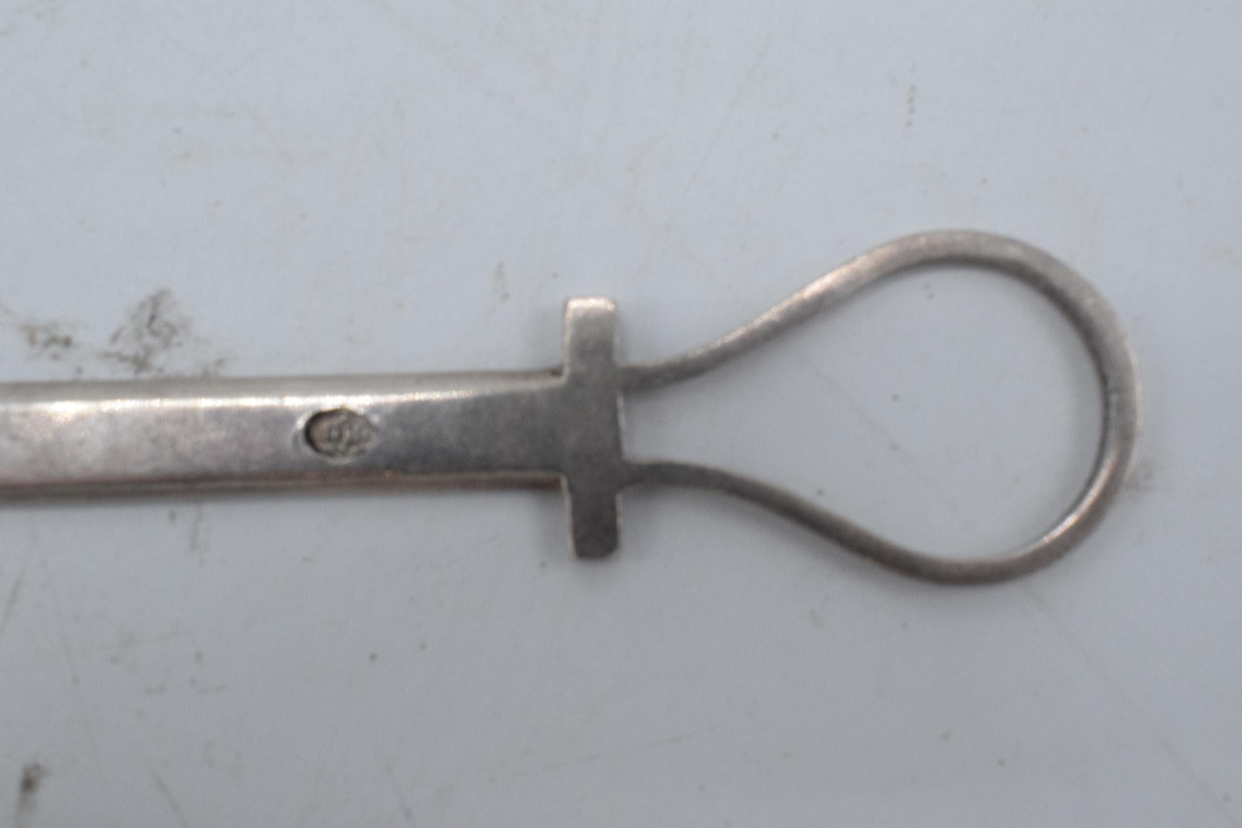 A silver handled letter opener together with a silver plated meat skewer (2). - Image 3 of 3