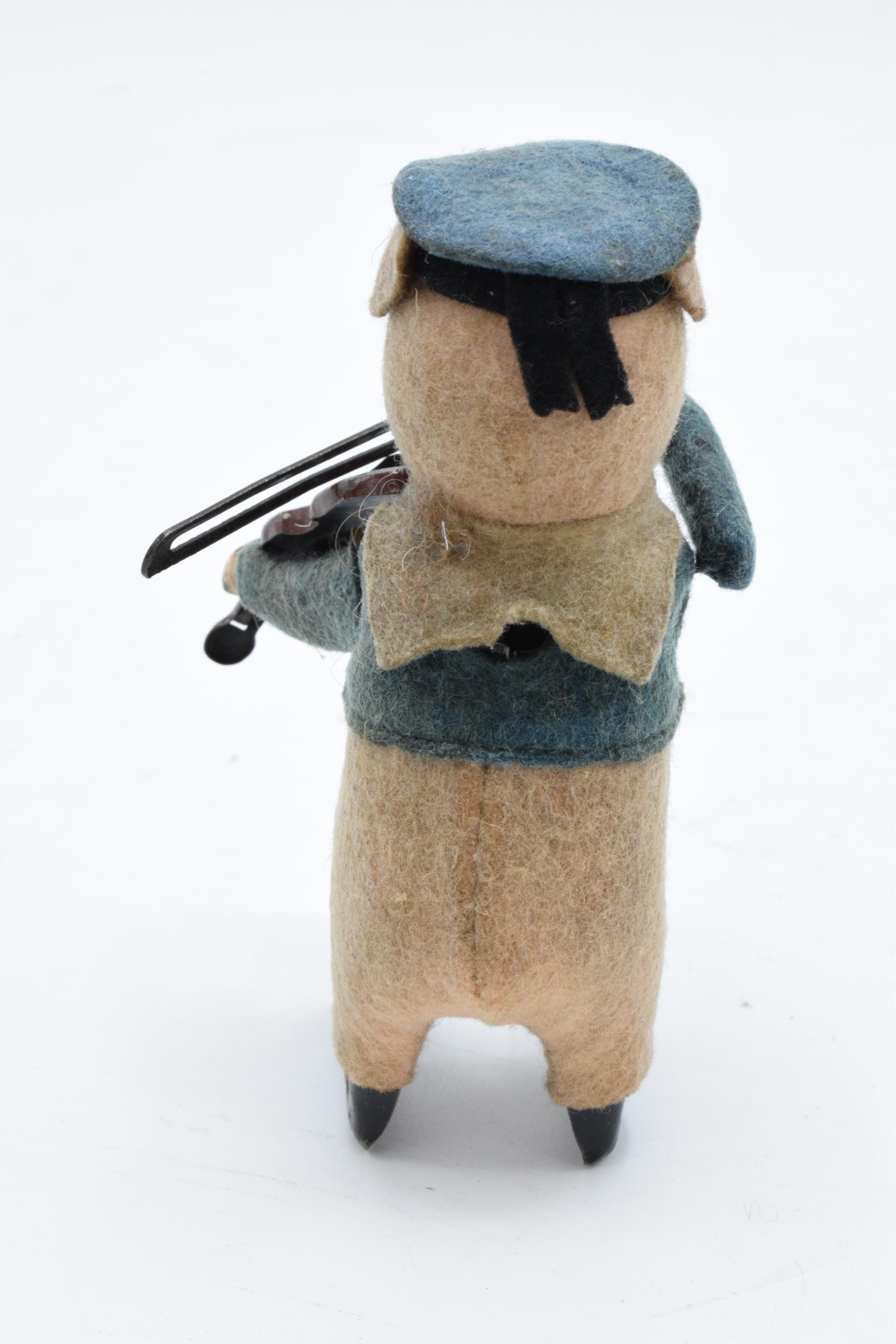 A Schuco circa 1930s clockwork toy figure in the form of a pig with a violin. Based on the Three - Image 6 of 9