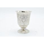 Continental silver footed beaker with engraved decoration. 9cm tall. 63.3 grams.