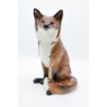 Beswick Fireside Fox 2348. The top half and body of the piece is in good condition however the