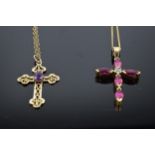 Two 9ct gold gem set crosses and chains - 3.5g