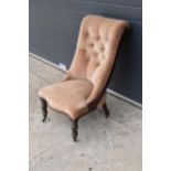 Edwardian upholstered button back parlour chair. 91cm tall.