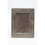 A silver fronted picture frame hallmarked for Sheffield 1993. 18 x 14cm. Some minor dents/