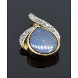 A 9ct gold pendant set with opal stone and illusion set diamonds. 1.0 grams.