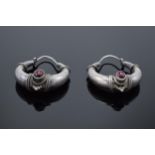 Continental silver thick earrings set with cabachon garnet stones earrings (unmarked). 10.6 grams