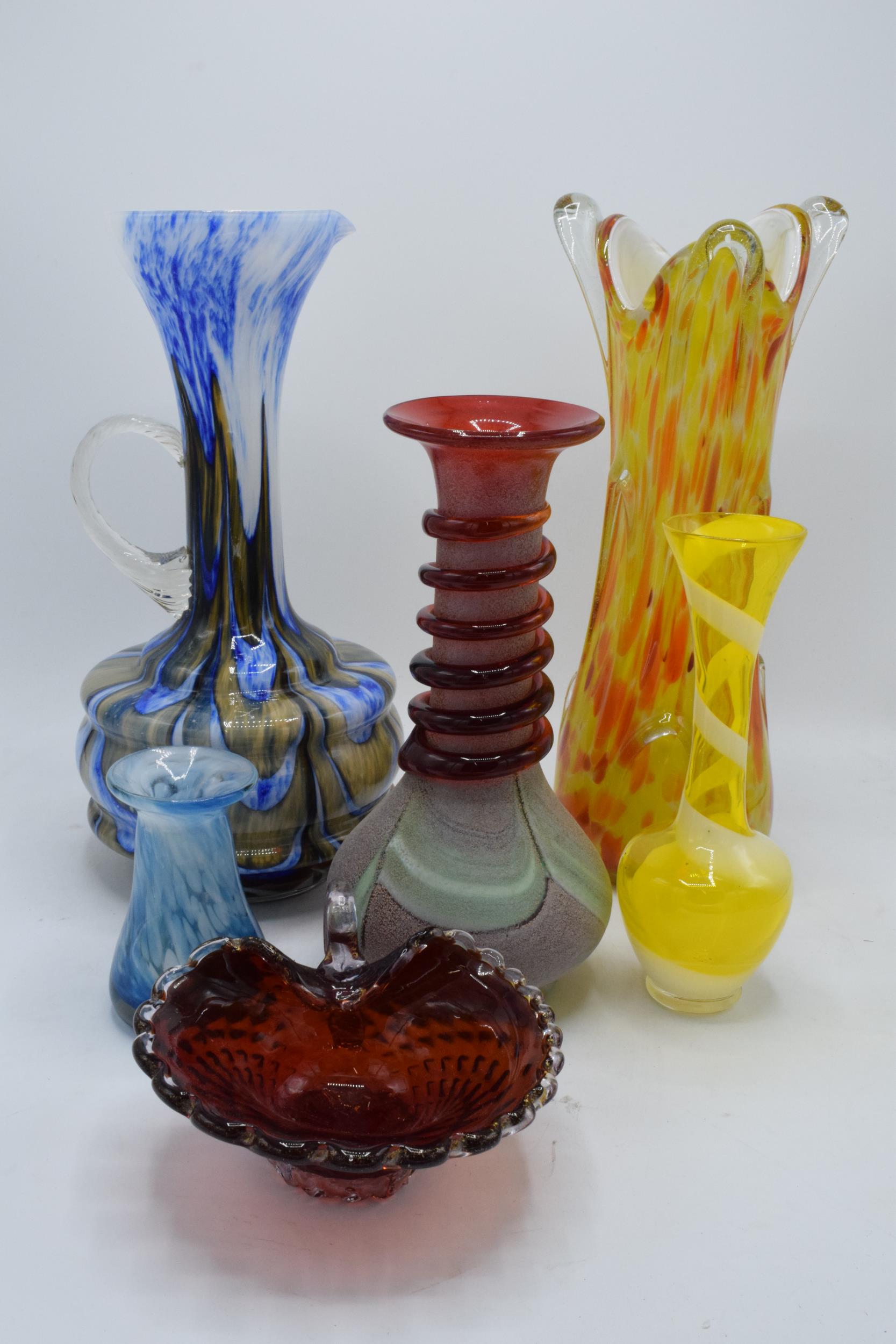 A collection of assorted art / studio glass in the form of jugs, vases, a dish etc. Condition is