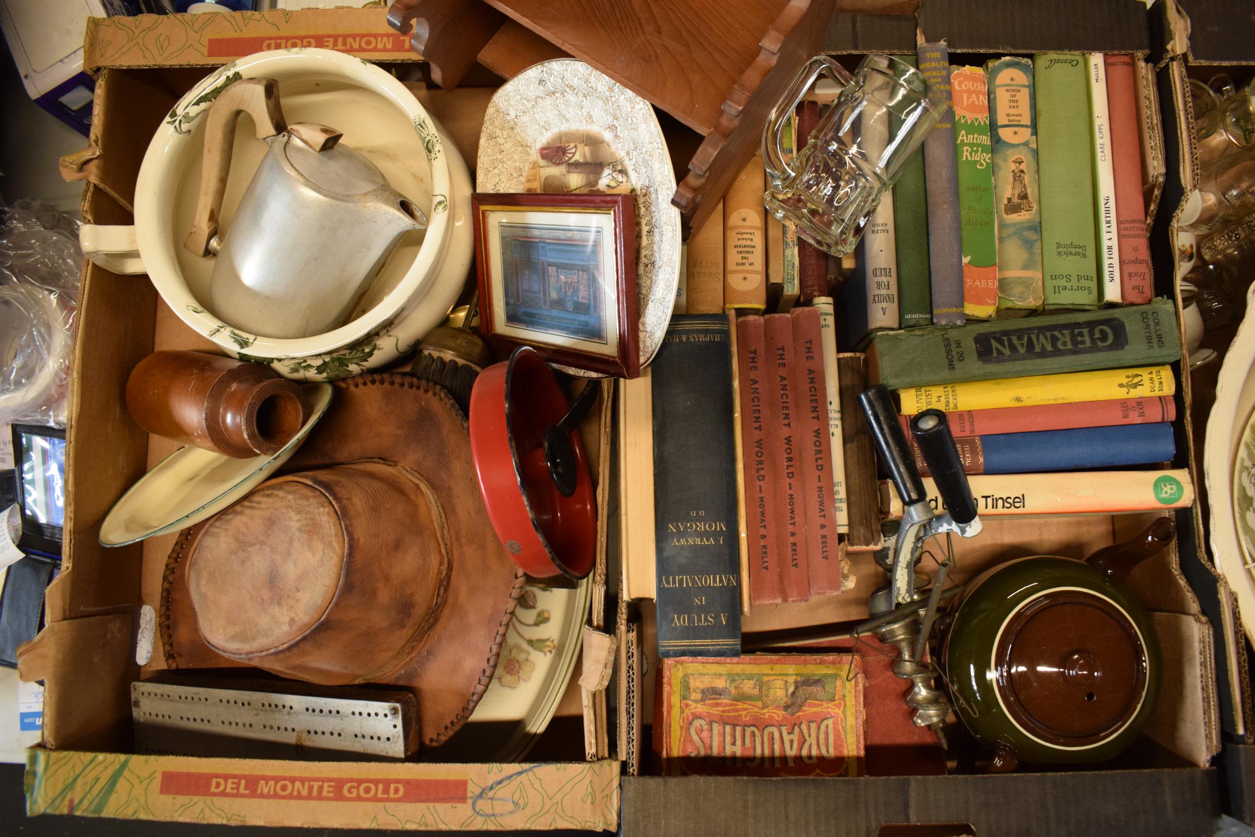 A mixed collection of items to include an enamel candlestick, leather hat, early 20th century