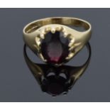 9ct gold ladies garnet ring. 2.6 grams. UK size S. UK hallmarks.