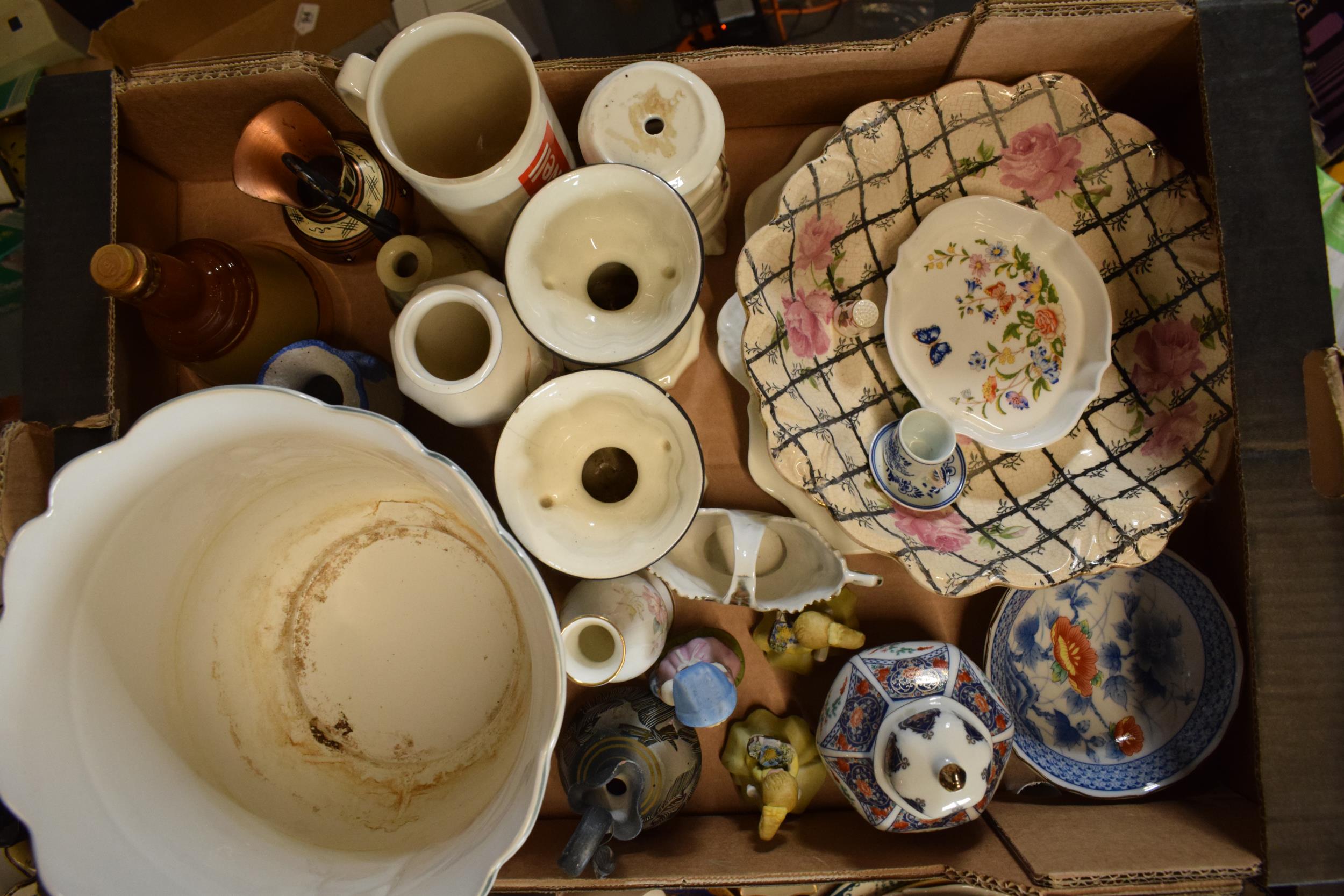 A mixed collection of pottery to include 20th century oriental items, pub advertising jugs, vases,