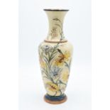 19th century Doulton Faience vase decorated with a floral design with impressed marks to base.