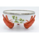 A 20th century Musterschutz bowl set on three feet in the form of lobsters with an EPNS rim. 26cm